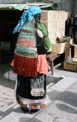 Woman, back showing costume