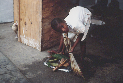 Child sweeping